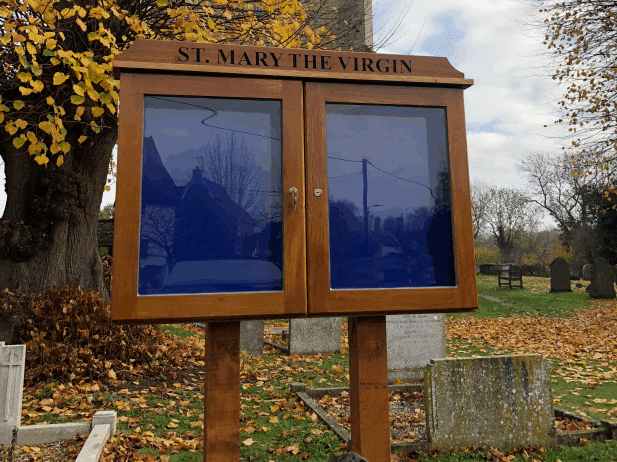 oak noticeboard on oak posts, church